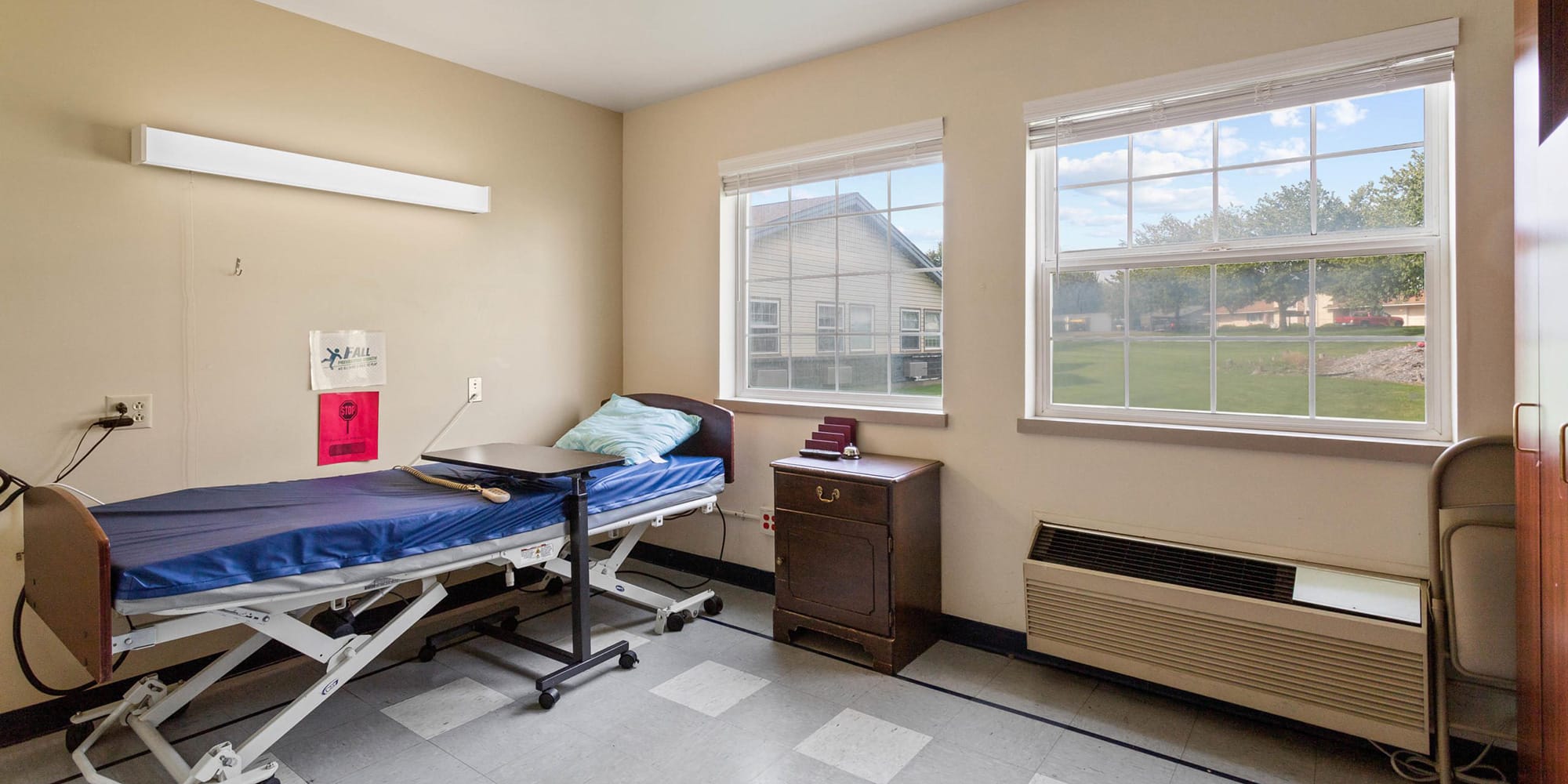 Patients room with a window at Sullivan Park Care Center